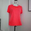 Camiseta deportiva rosa fluor